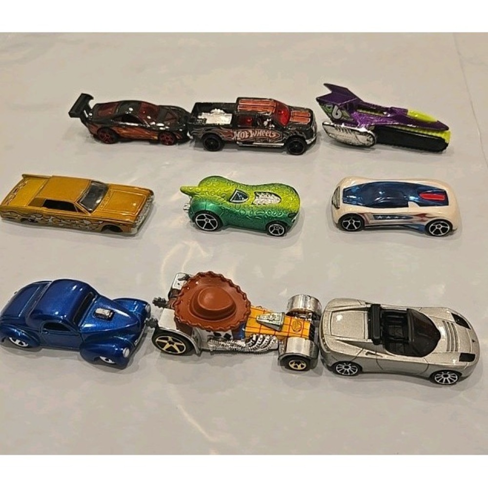 Hot Wheels 9-Car Diecast Mixed Lot. Tesla, super Tsunami, 2009 Ford,Toy story...